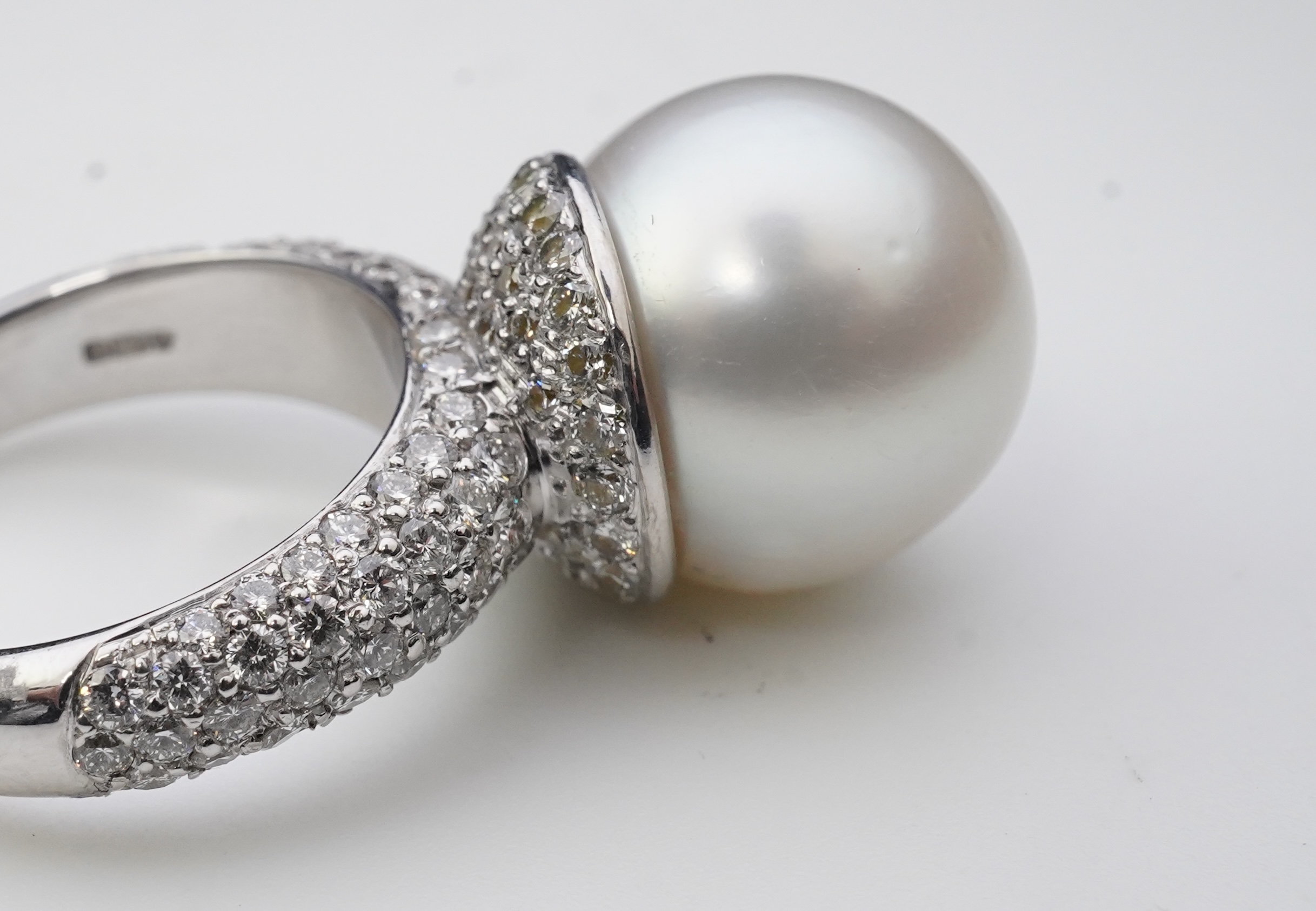 A South Sea cultured pearl and diamond ring